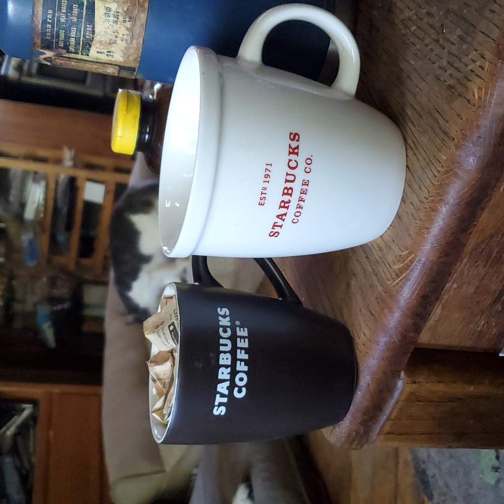 Starbucks White Mug with Red Logo and 12 oz. chocolate color Starbucks cup
